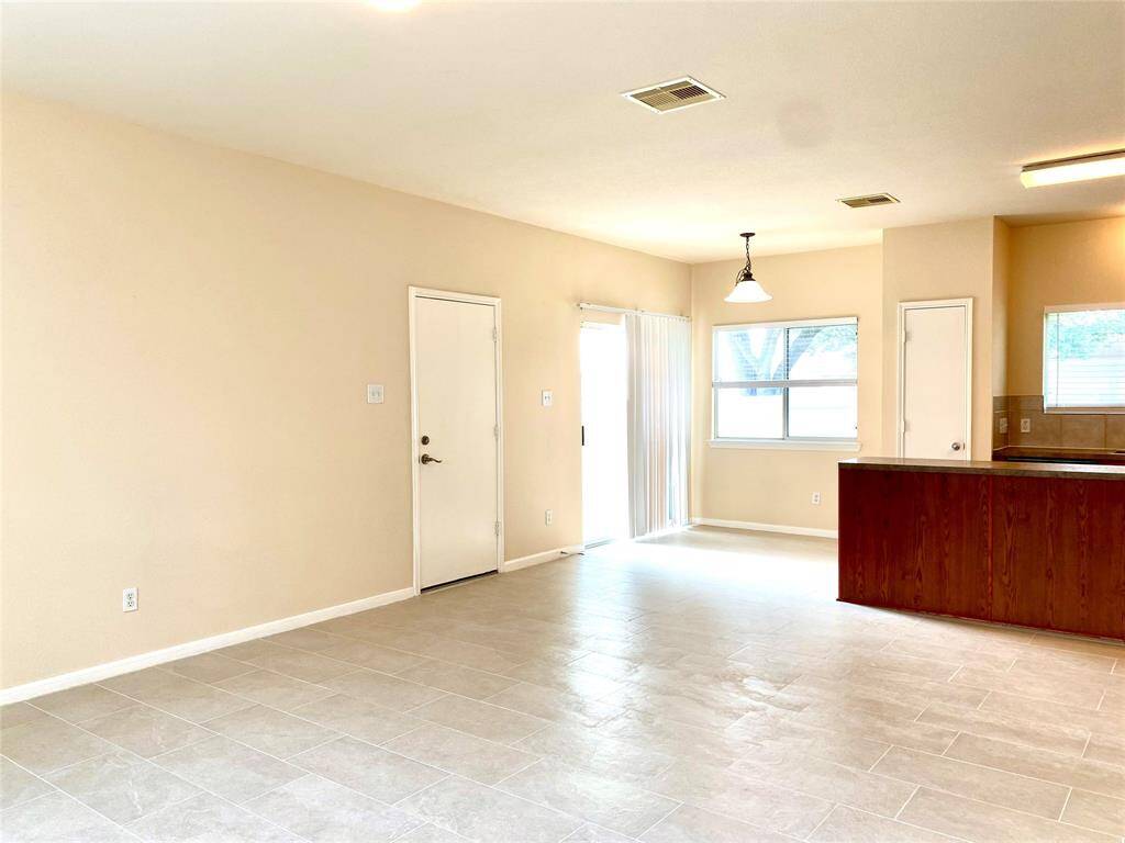 The large two car garage is attached, and is accessed from the family room and just steps from the kitchen - no long trips in the rain coming in with groceries!