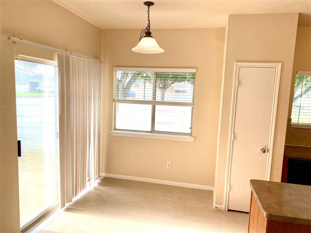 Patio door opens to courtyard