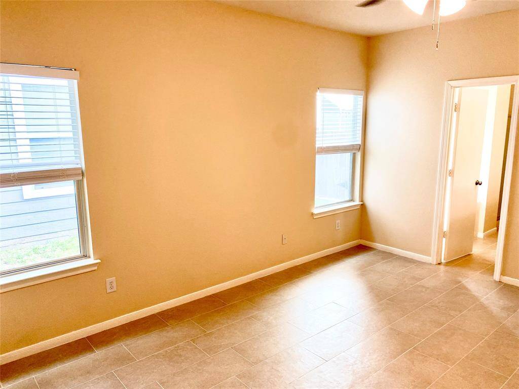Primary bedroom is light and bright, and has en suite bath