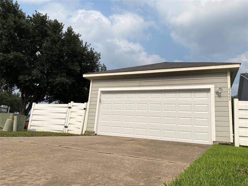 Large two car garage with automatic door to keep your car cool and protected from the elements.