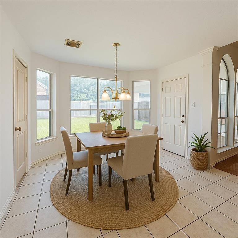 Large Breakfast area overlooking the beautiful backyard