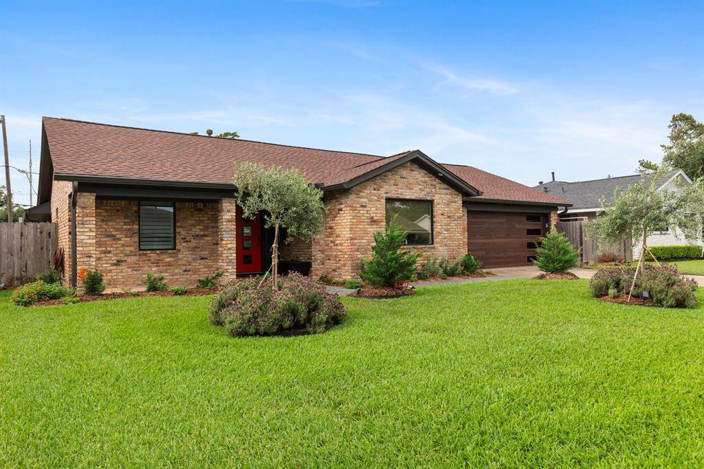 Beautifully updated mid-century Timbergrove home located a short walk away from Jaycee Park. Exterior updates include roof, gutters, windows, lighting, and garage door.