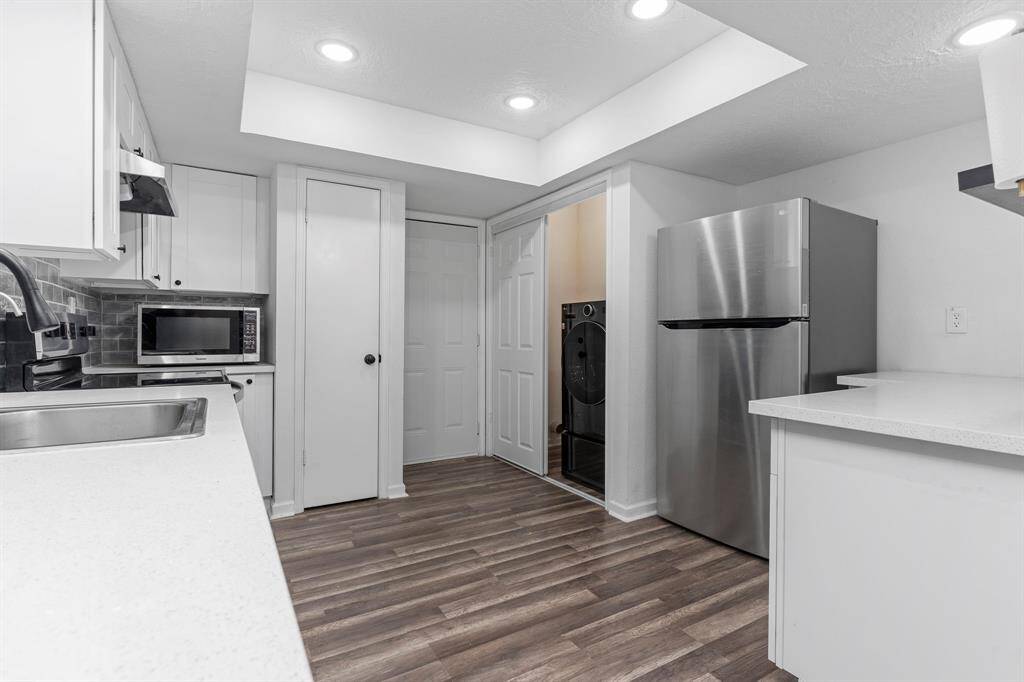 This gourmet kitchen will surround you with counterspace and cabinets!