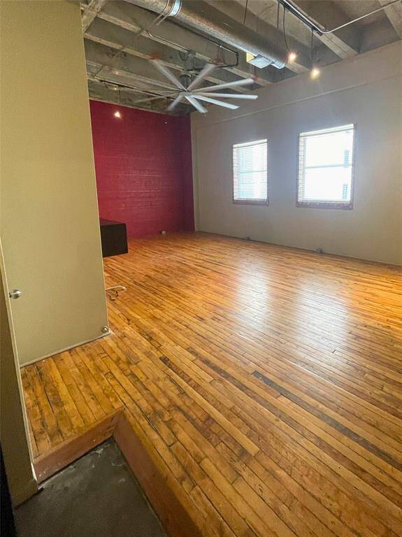 tall ceilings and natural hardwood greet you as you enter.