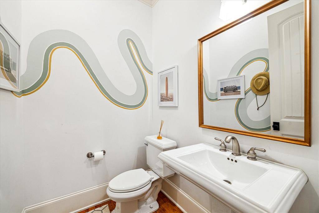 Sleep soundly in the serene owner’s suite, where you’ll find a king-size layout, a new ceiling fan, two custom walk-in closets and an en suite spa bathroom.