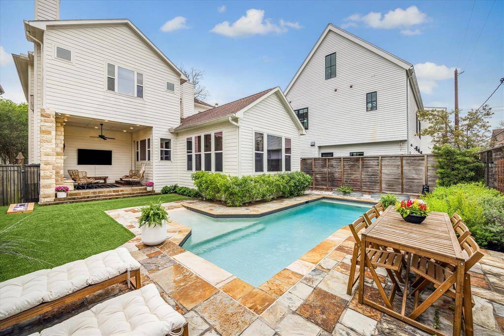Exceptional indoor-outdoor living awaits in this turnkey four-bedroom, three-and-a-half-bathroom stunner offering expansive designer interiors and a poolside oasis in desirable Houston Heights.