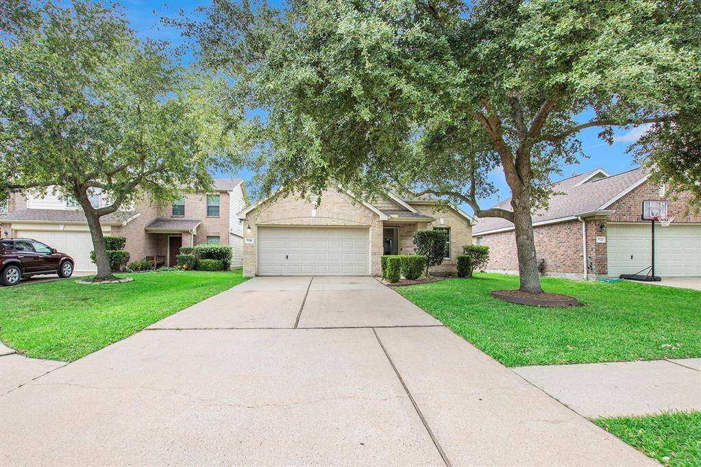 This charming brick home features great curb appeal and a beautifully maintained driveway leading to a two-car garage with remote control access. The inviting entry sets the tone for a warm and welcoming interior. A perfect blend of convenience and classic design awaits just beyond the curb.