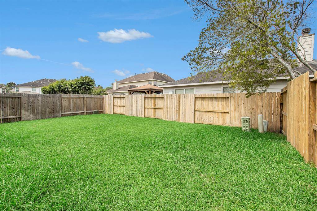 This view mirrors the peaceful outlook you’d enjoy sitting at your breakfast nook indoors—perfect for watching your kids play, pets run around, or simply appreciating the natural scenery. It’s a serene and inviting space that truly connects you to the outdoors.