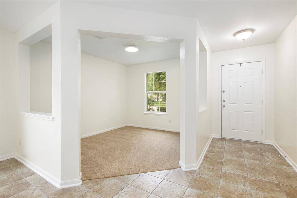 Just off the entryway, a versatile corner room offers endless possibilities, perfect as a front office, cozy reading nook, children’s play area, or even a stylish lounge. Easily transform it by adding French doors for privacy and function tailored to your lifestyle.