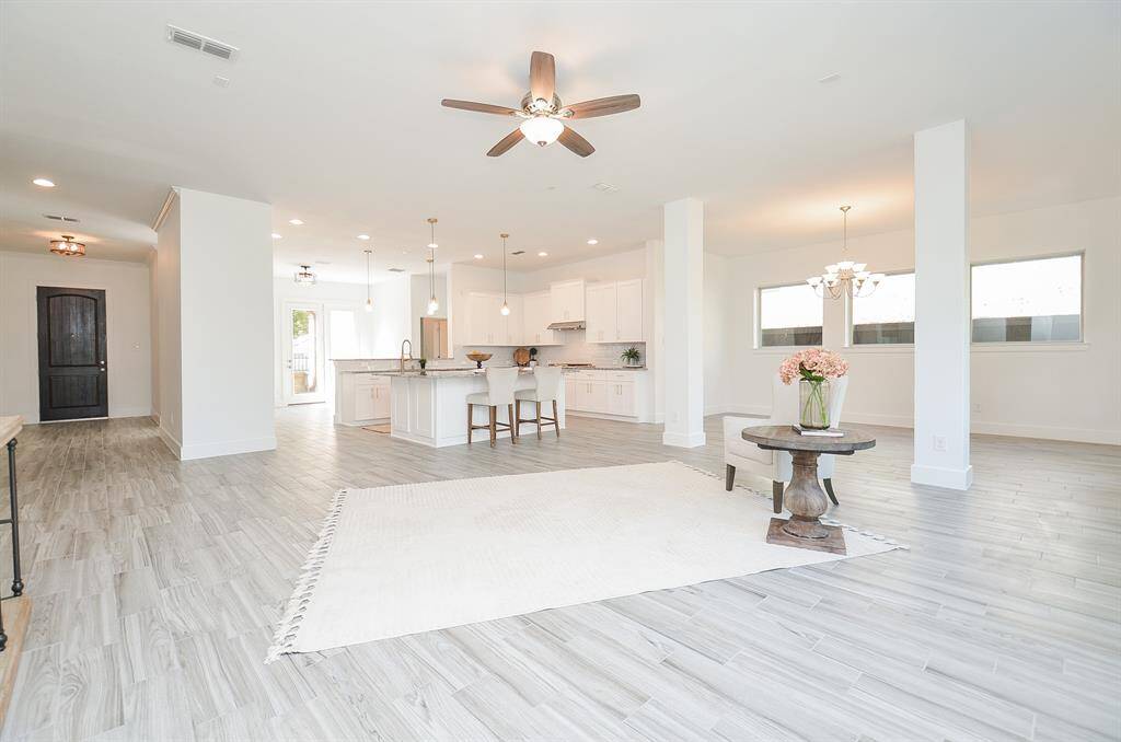 The Open Floorplan Concept Incorporates the Breakfast - Kitchen and Living Areas