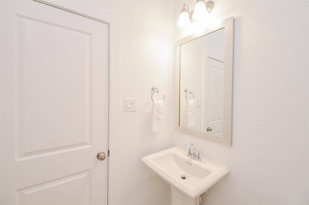 Downstairs Powder Room for Guests Convenience