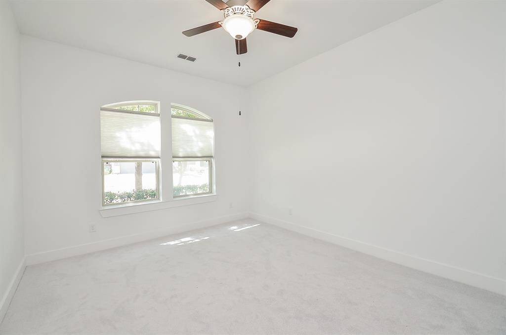 The Home Features Two Bedrooms with TDownstairs Secondary Bedroom - Perfect for a Second Home Office or Guest Room