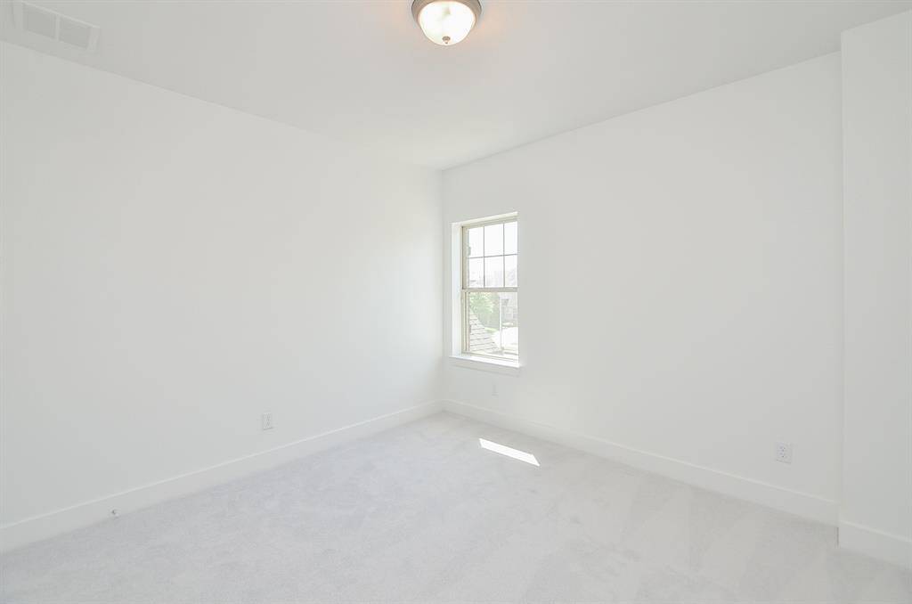 Upstairs Secondary Bedroom with Ample Space and Large Closet