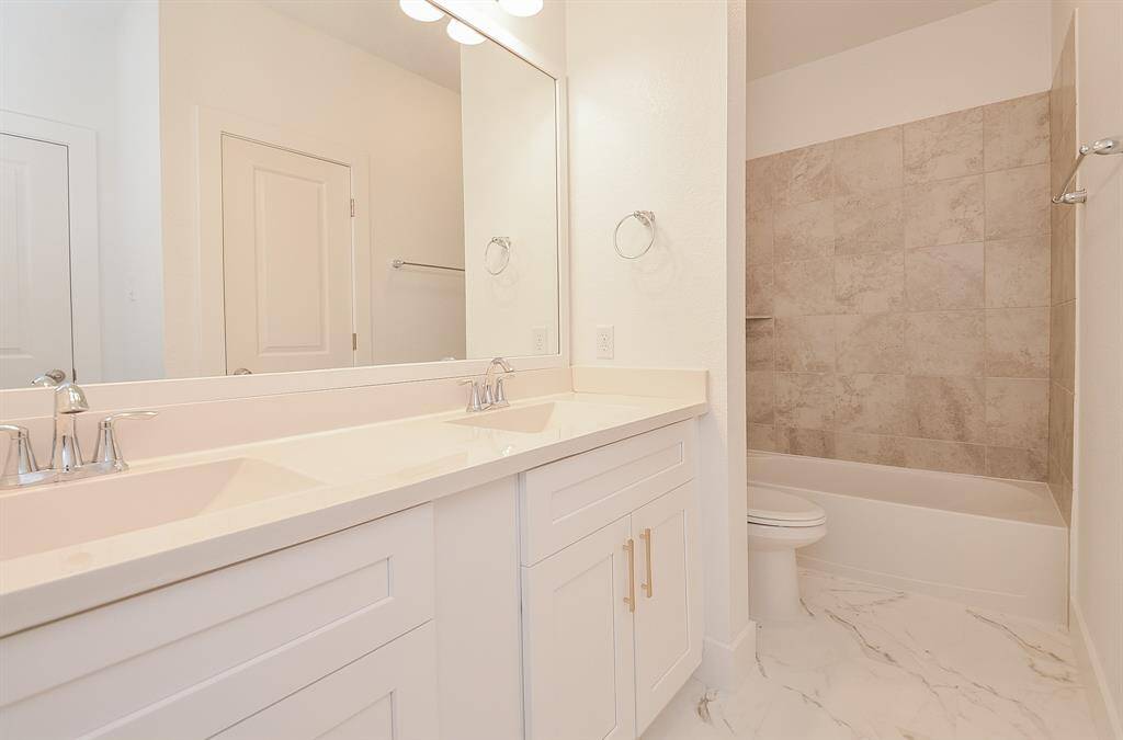 Secondary Upstairs Bathroom with Duel Sinks