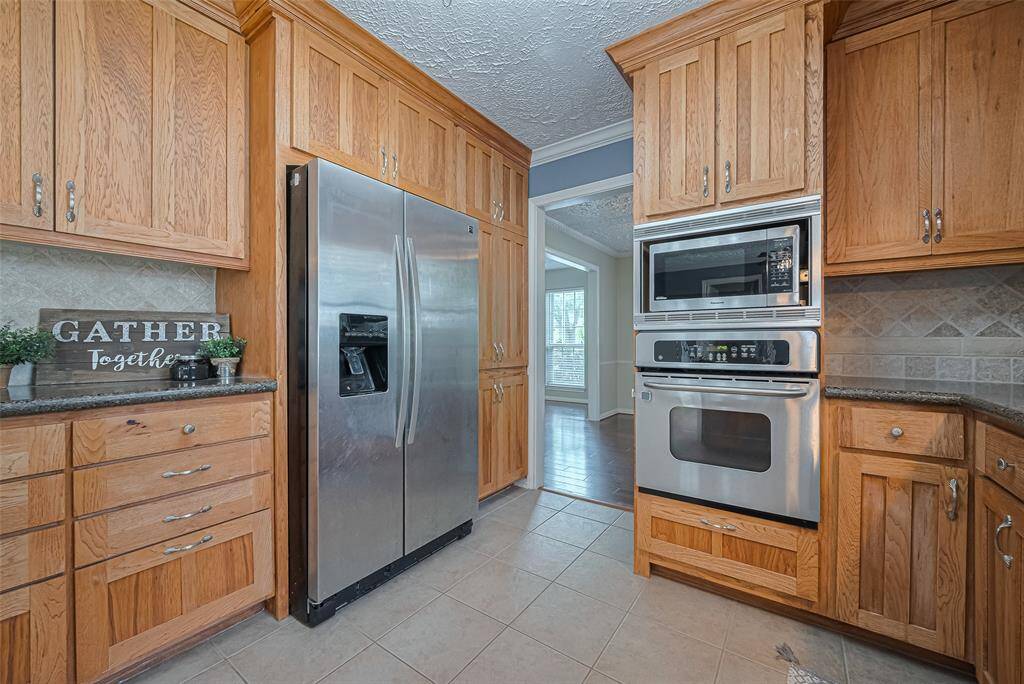 The kitchen is spacious and open.
