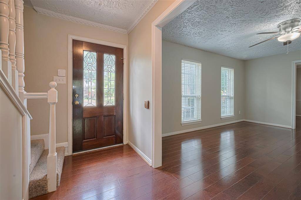 Lovely entry way with formal living room.