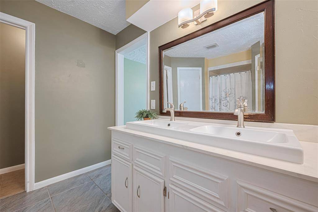 Dual sinks in the primary bathroom.