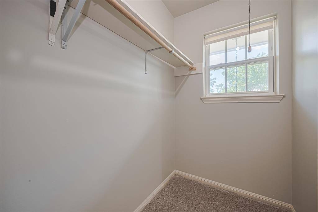 Very large walk in closet with window
