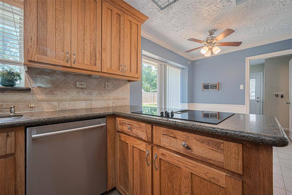 These gorgeous cabinets are custom and handmade.  Beautiful wood finish.