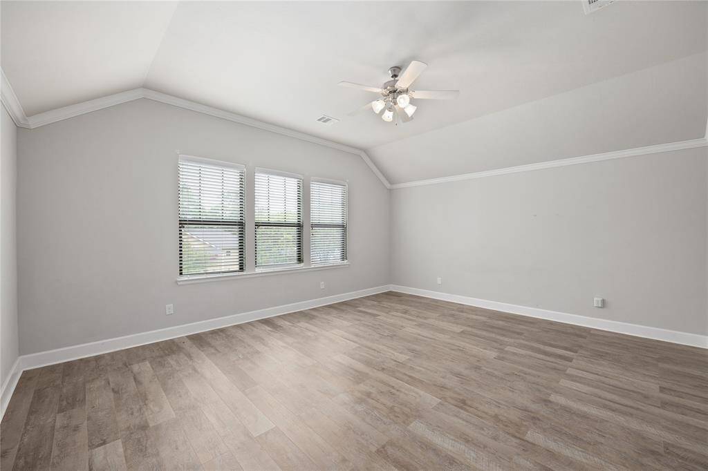 Primary Bedroom is super spacious and bright!
