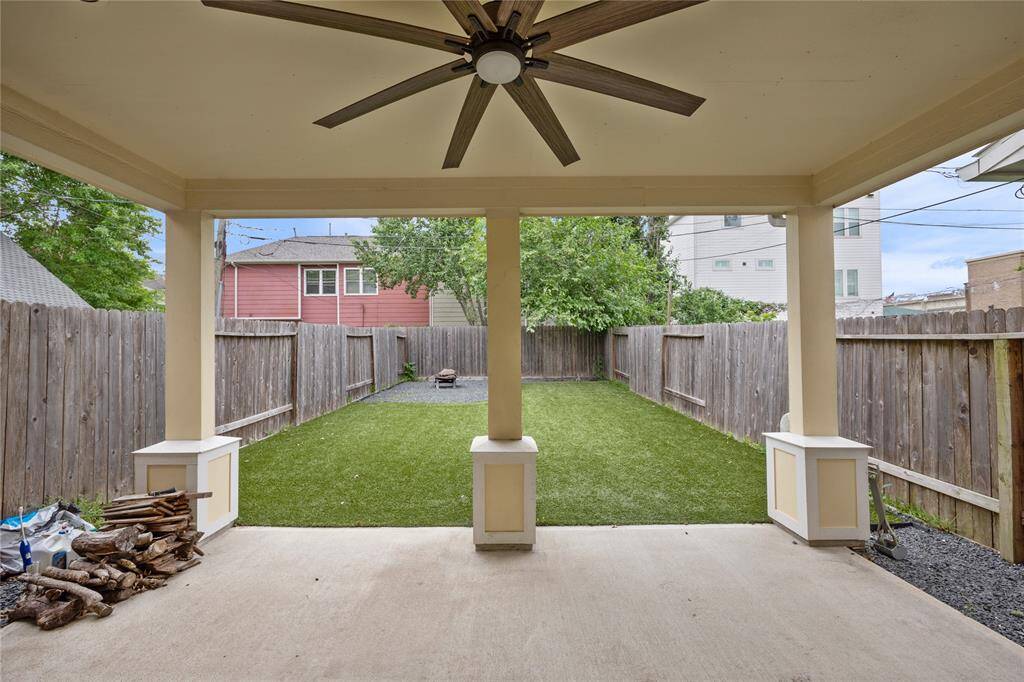 View of the professionally installed astroturfed backyard! Tons of room for your Human or Fur - Babies to roam around (and not get muddy)!