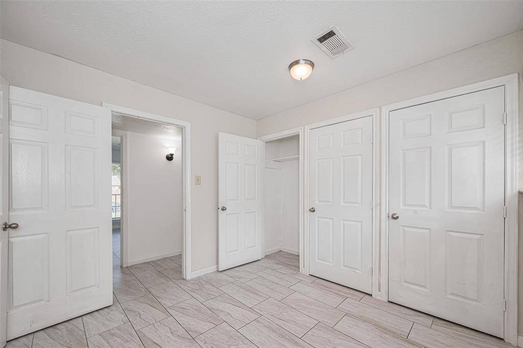Secondary bedroom with plenty of closet space.