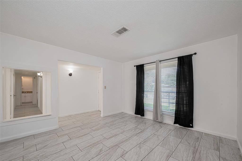 Alternate view of the living space looking onto the entry.