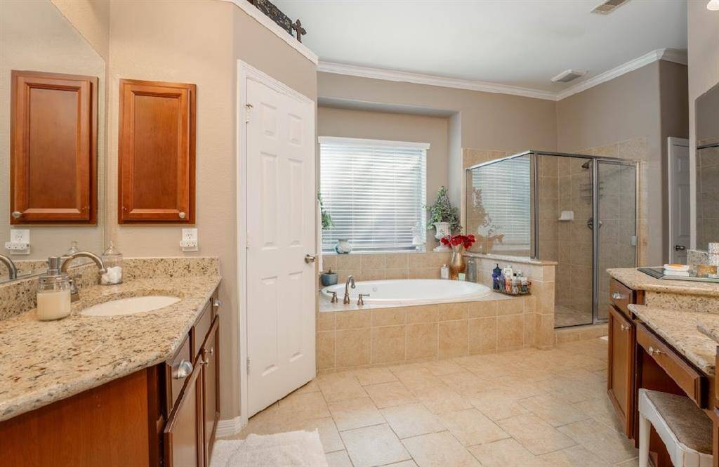 There is plenty of space to get ready with the double vanities.