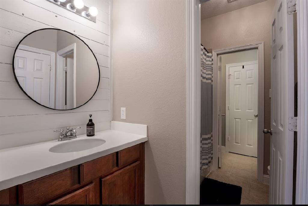 Newly renovated Jack-and-Jill bathroom upstairs.