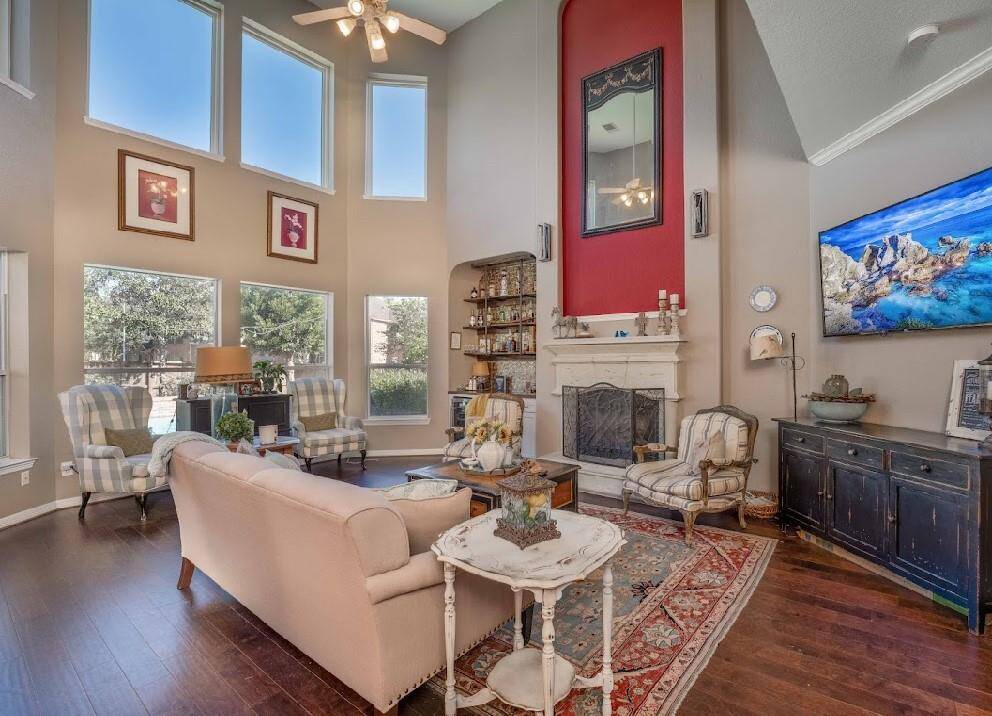 Large windows allow for plenty of natural light in the living room.
