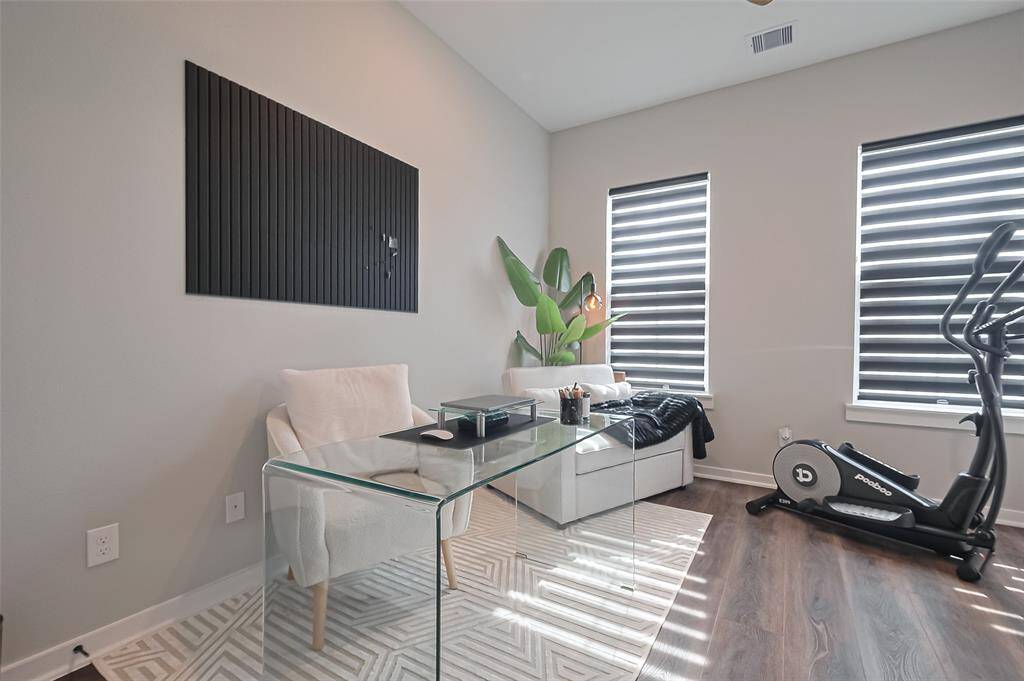 Room was converted to a home office/workout space.