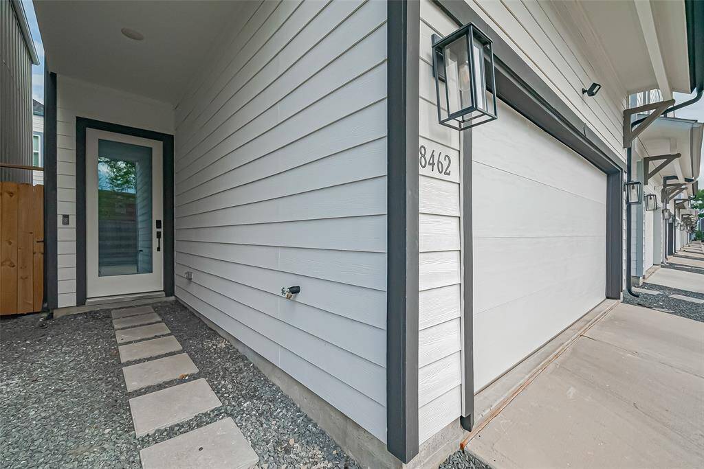 The front entrance to this home features a digital lock pad that can be programmed with a code of your choice.