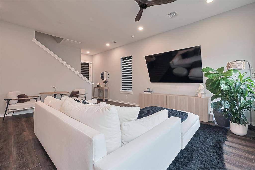 This space is currently set up with a rotating wall mount holding an 86in television! Wall mounts are included for 3 TVs.