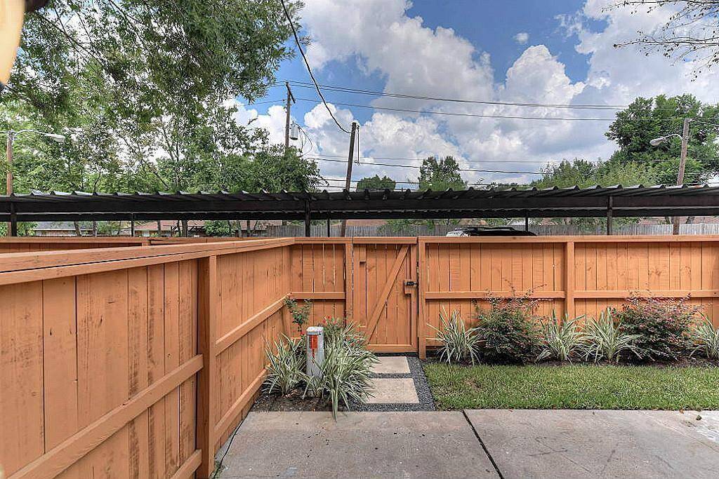 Enjoy a summer cookout on your landscaped, privately fenced back patio.