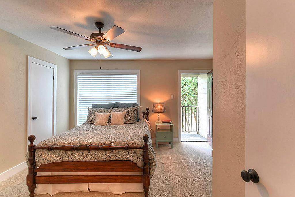 Enjoy a morning coffee on your very own upstairs balcony facing Kempwood.
