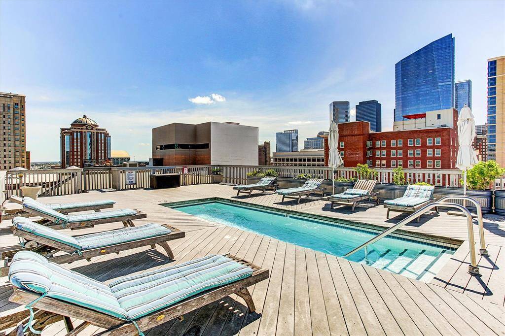 Pool terrace with urban views.