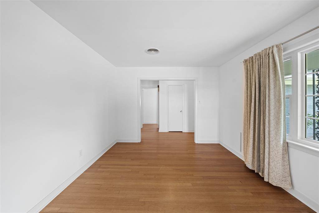 View from the formal living room to the front foyer.  Light and bright is the theme for this house!