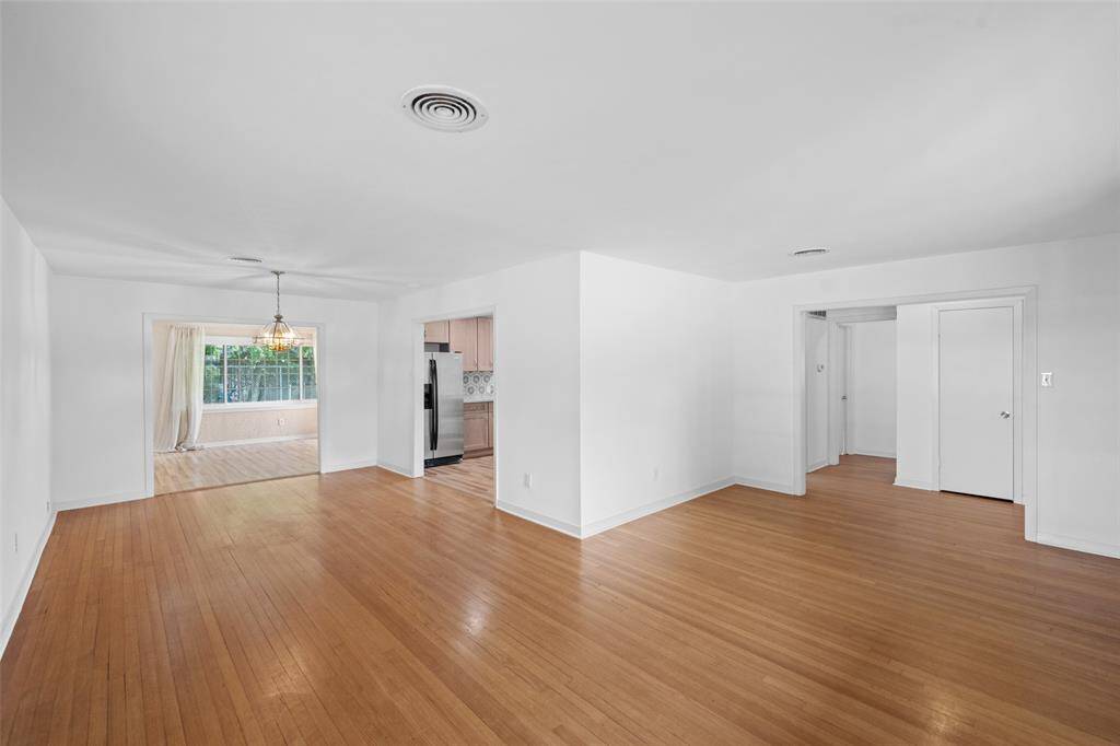 House features a large dining area adjacent to the kitchen.  Lots of natural light in every room.