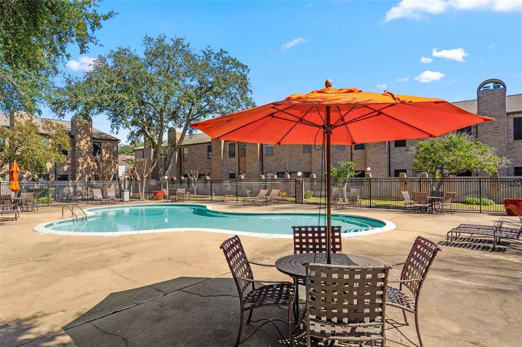 Relax and unwind at the beautifully maintained community pool! Whether you're soaking up the sun on a lounge chair or cooling off with a refreshing swim, this serene space is perfect for leisure and entertaining. Enjoy the shaded seating areas, lush surroundings, and a peaceful retreat right outside your door!