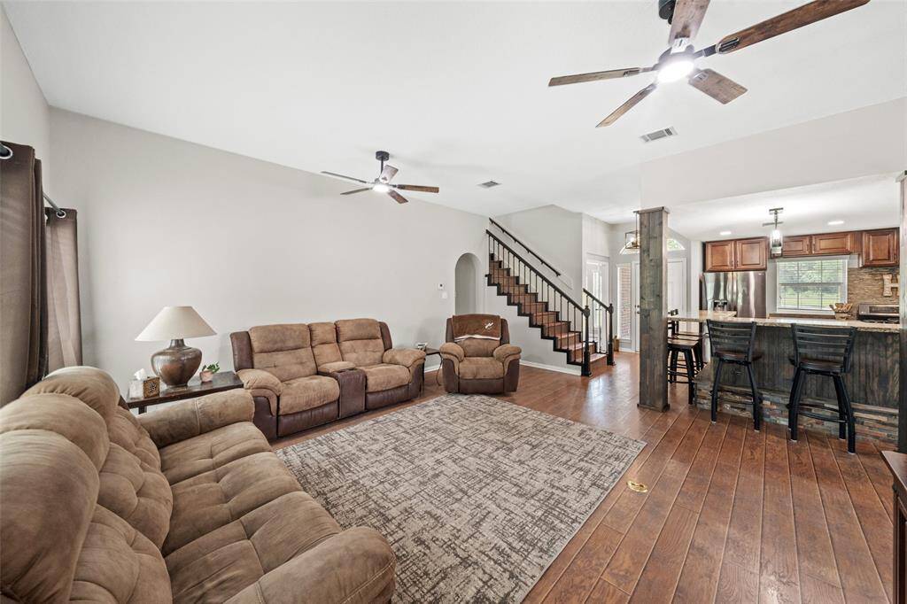 Open concept - living room looking into kitchen and breakfast area