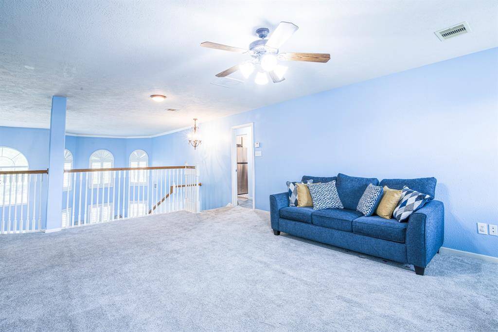 To the other side of the game room is the entrance to the fully independent suite with kitchenette.