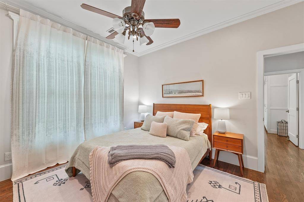 Primary bedroom is privately located in the back of the home.
