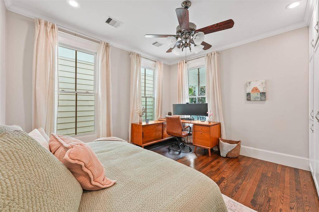 Secondary bedroom is located at the front of the house. Great option for a guest bedroom or home office.