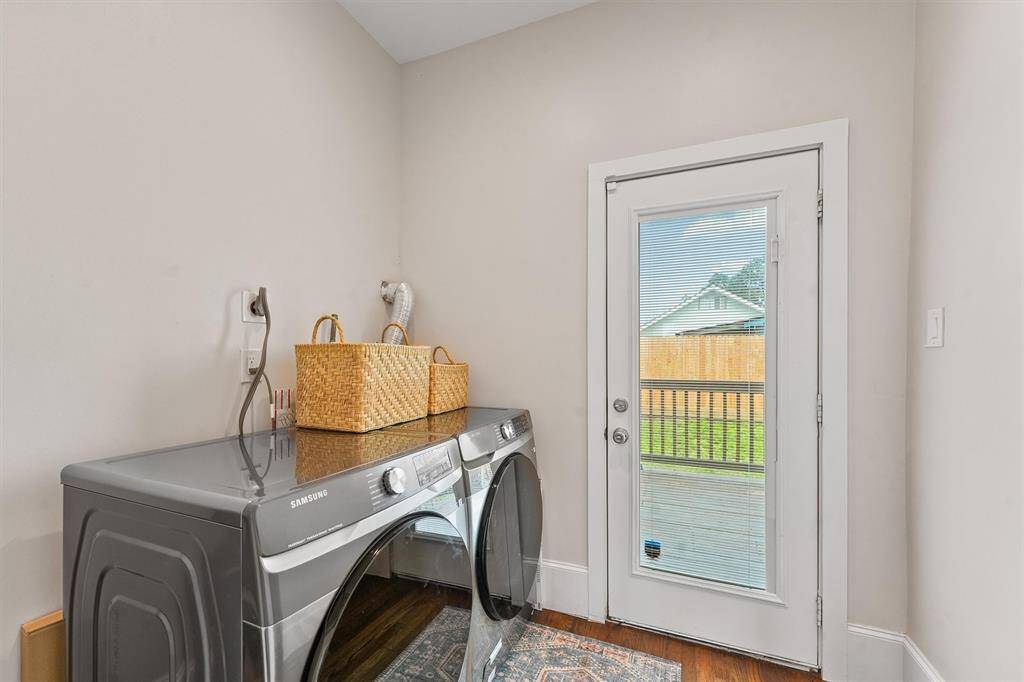 Nearby the kitchen, useful utility/laundry room.