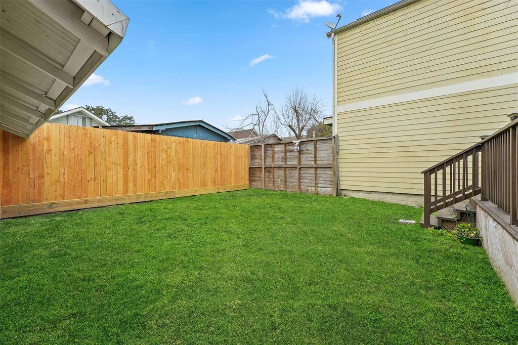 Newly constructed high fence allows adequate privacy.