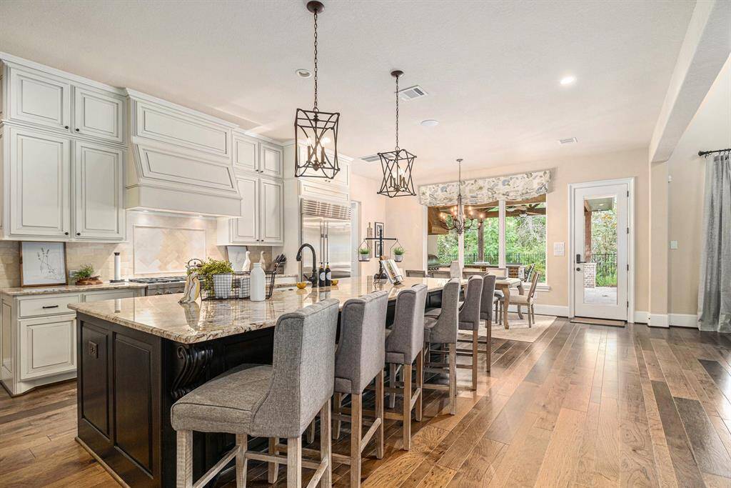 Boasting stunning granite countertops, high-end appliances and an open layout to the breakfast area, this kitchen is perfect for every occasion.