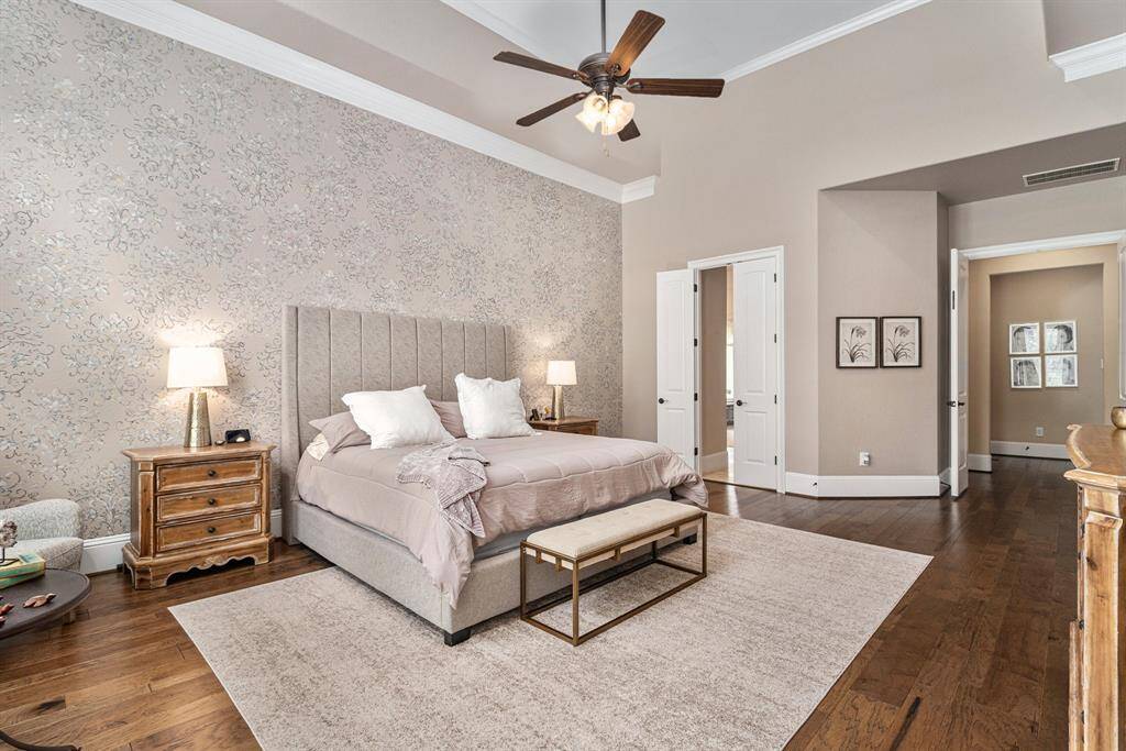 The master bedroom is a luxurious space designed to offer both tranquility and sophistication.