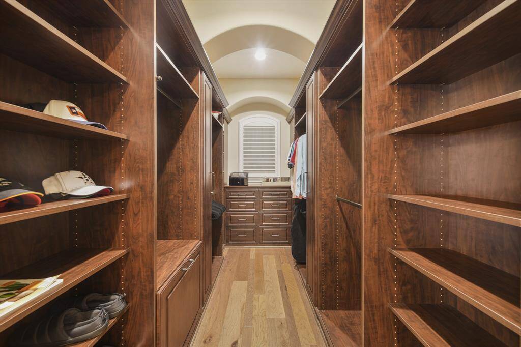 1 of 2 Master walk-in closet, provides ample space.
