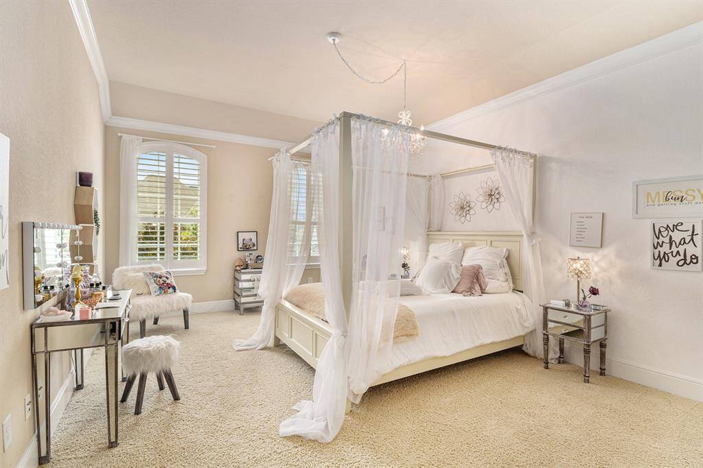 Step into this inviting secondary room, where natural light ours in through large windows, creating a bright and airy atmosphere.