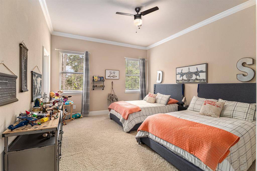 Discover this secondary room's generous size and abundant natural light providing a serene and inviting environment perfect for relaxation and comfort.
